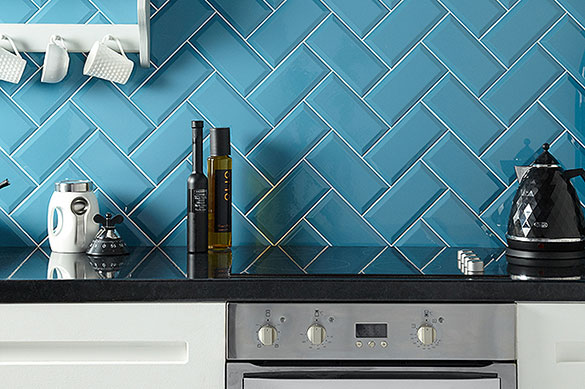 bright blue brick style porcelain tiles laid in a brick pattern for a kitchen splash back