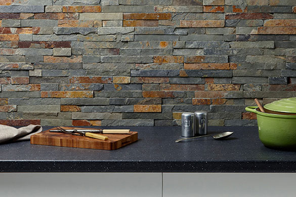 This industrial look kitchen splash back features Verona split face slate tiles 