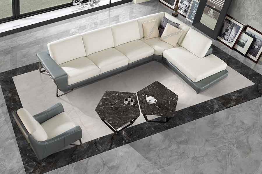 This elegant lounge features marble effect floor tiles from Porcel-Thin in Luna Grey colour