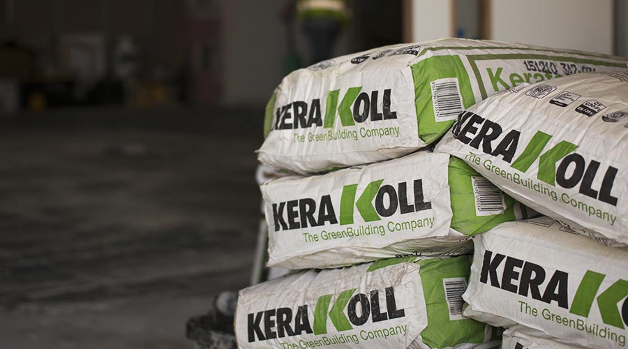 In total 81 bags of Kerakoll eco-friendly tile adhesive were used to lay the new porcelain tiles at Yeomans Nissan Worthing by UK Tiles Direct