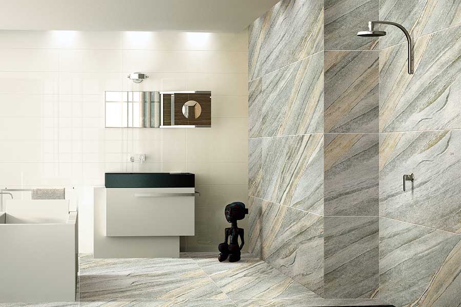 A large modern wetroom featuring large 120x60cm thin stone effect porcelain tiles from Porcel-Thin