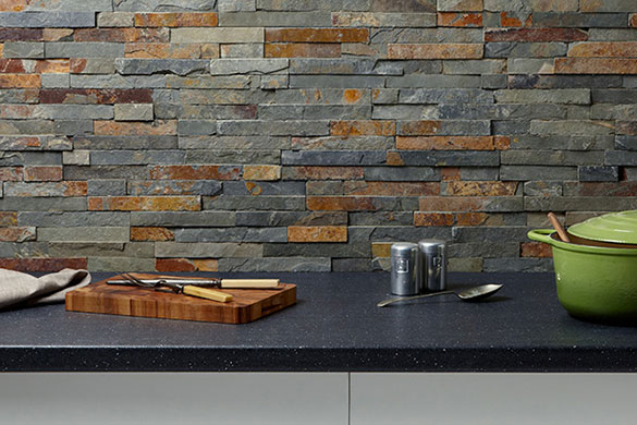 This industrial look kitchen splash back features Verona split face slate tiles 