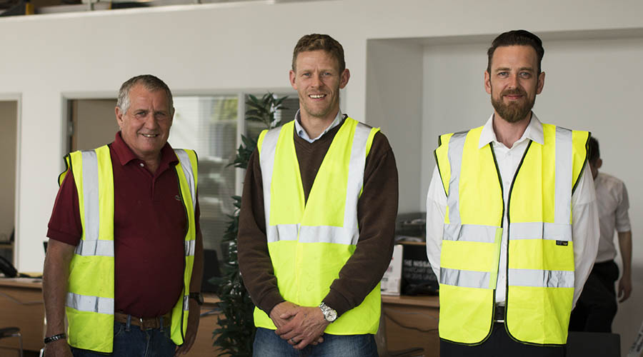 Andy Curtis of Kiwi Design with UK Tiles Direct managing director David Burgess and Mark Jory or Kerakoll at Yeomans Nissan Worthing