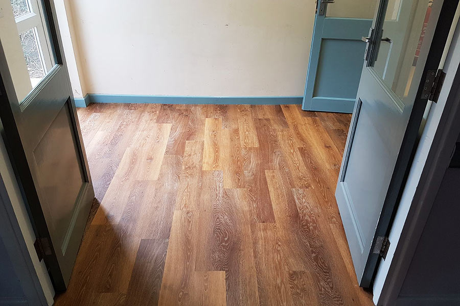 Smart entrance to Wareham village hall with new oak effect Karndean vinyl plank flooring